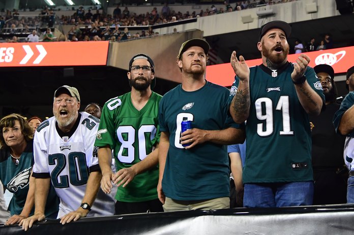 A Philadelphia Eagles fan cheers on his team during the game