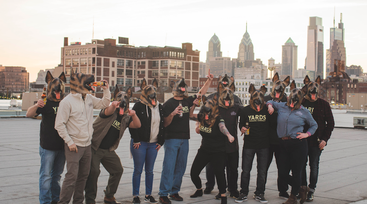 Yards staff in underdog masks on Philly rooftop