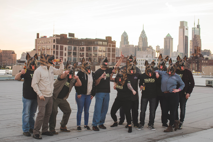 Yards staff in underdog masks on Philly rooftop