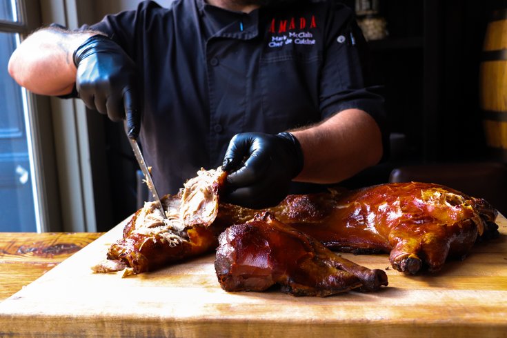 Roasted suckling pig is served during Amada's Cava y Cochinillo dinner