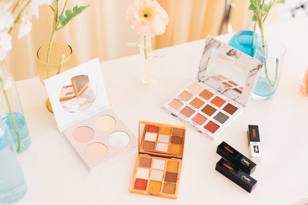 A collection of makeup on a table