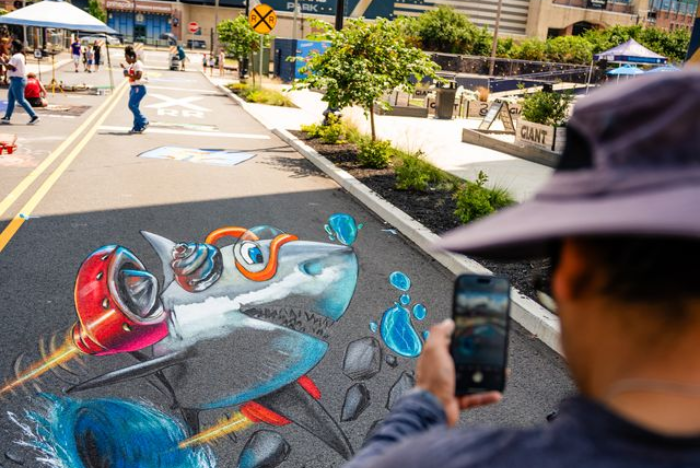 Large-scale chalk murals during Delco Chalk Fest