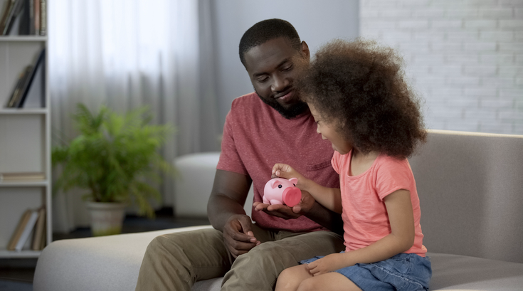 Purchased - A father teaching his daughter about finances
