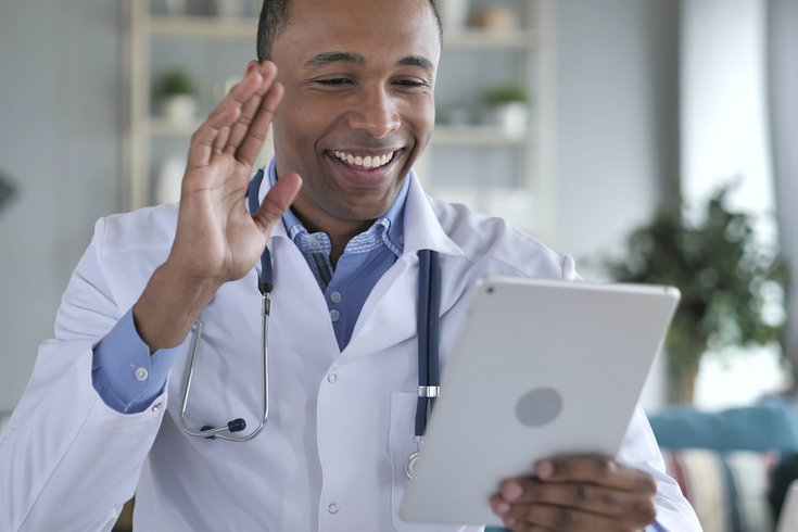 Purchased - doctor talking to patient via telemedicine