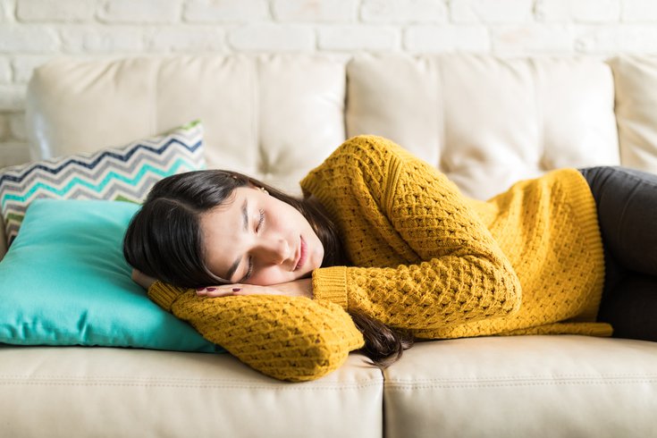 Woman taking a nap on the couch