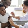 Purchased - Baby getting vaccinated by a doctor