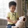 Boy playing doctor with stuffed animal