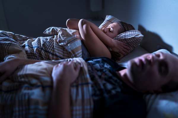 Man snoring causes woman to not be able to sleep