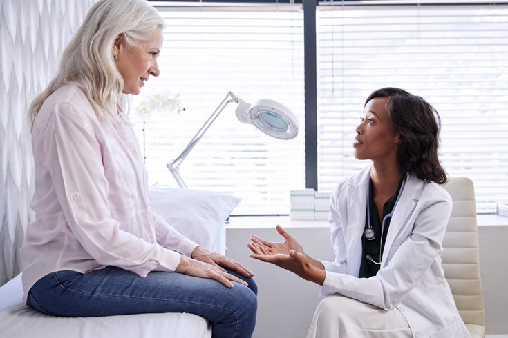 Woman speaking with her doctor