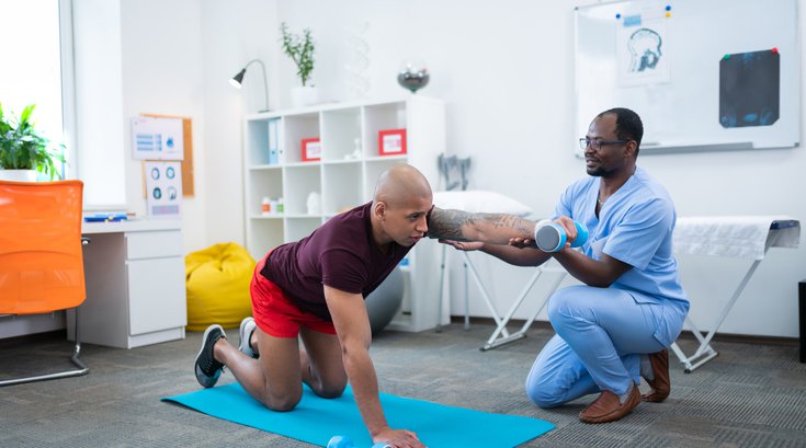 Purchased - Physical Therapist helping Athlete Recover