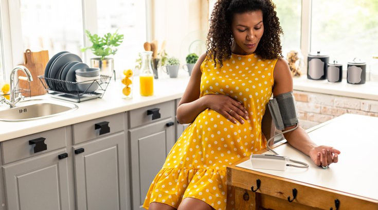 Purchased - pregnant woman during blood pressure measurement