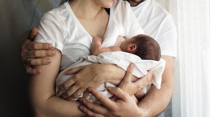 Father and mother with a newborn son.