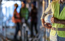 Purchased - Construction workers on a work site