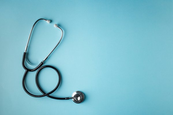 Doctors instrument on blue background