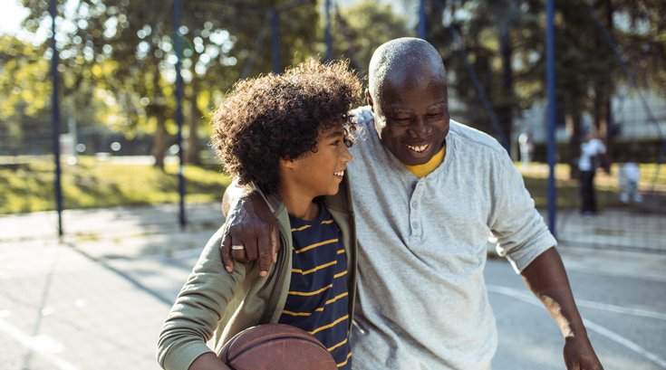 Purchased - Grandfather playing basketball with his grandson