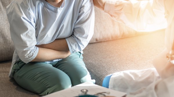 Abdominal pain sitting on couch