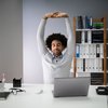 Businessman Stretching His Arms stock photo