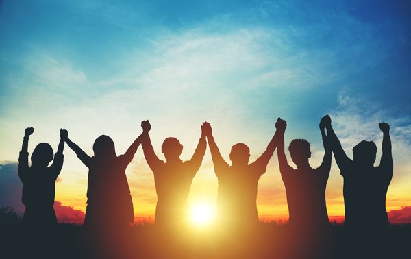 Purchased - Friends supporting each other sunset