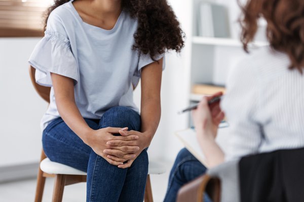 Photo of two women having a discussion