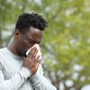 Purchased - Man sneezing from spring allergies