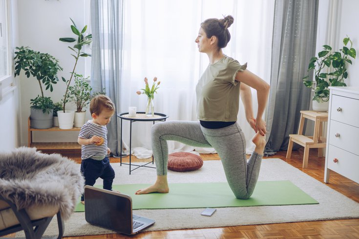 Mom and child workout stock