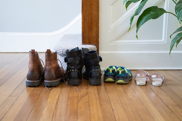 Purchased - Shoes lined up in the foyer