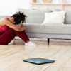 Purchased - Woman Crying Sitting Near Weight-Scales