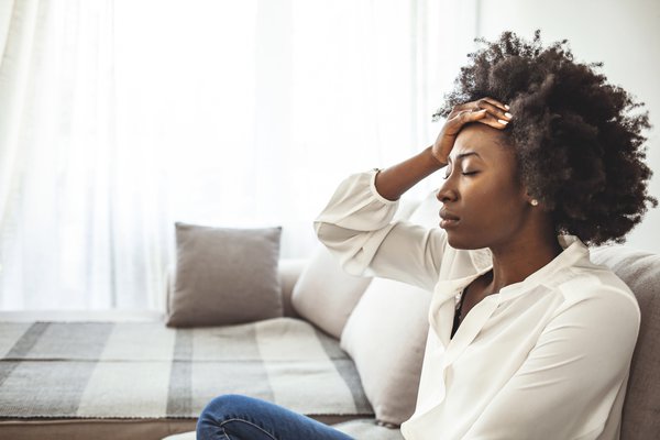 Purchased - Young woman suffering from anxiety and stress