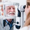 Purchased -Elderly patient being examined by an eye doctor