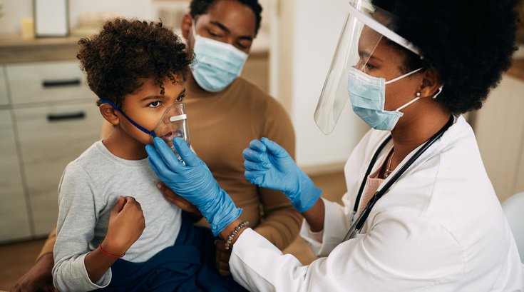 Purchased - boy receiving asthma treatment from doctor
