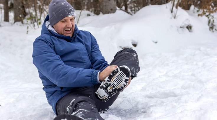 Purchased - Mature male feeling the pain of a strained muscle.