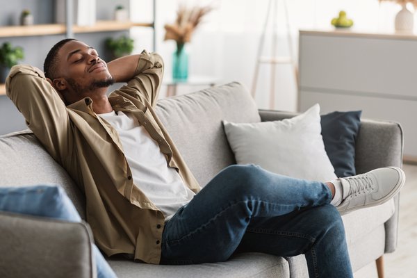 Purchased - Man sitting on the couch relaxed