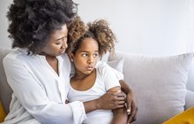 Purchased - loving mother consoling daughter