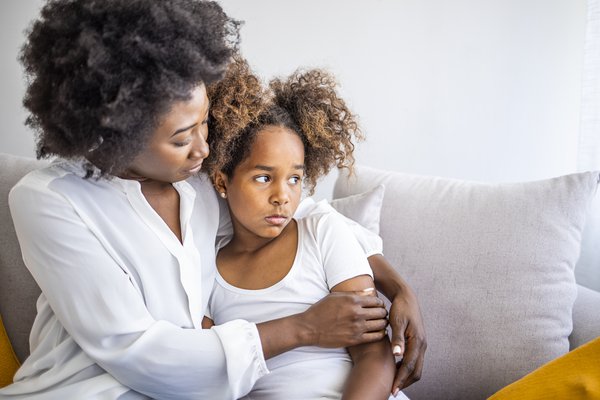 Purchased - loving mother consoling daughter