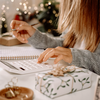 Purchased - Woman checking her holiday expenses