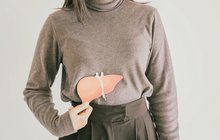 Purchased - Woman holding liver paper cut, hepatitis vaccination, liver cancer treatment