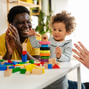 Purchased - Parents playing with their daughter