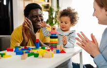 Purchased - Parents playing with their daughter