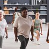 Women exercising with dumbbells in gym