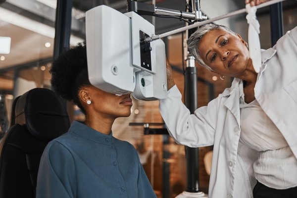 Purchased - Eye exam, vision and woman patient in optometry clinic for testing, eyesight and optical assessment