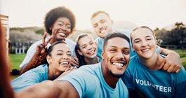 Purchased - volunteer group selfie outdoors
