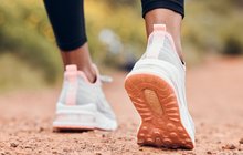 Purchased - Shoes, fitness and person walking or hiking for outdoor exercise