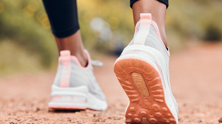 Purchased - Shoes, fitness and person walking or hiking for outdoor exercise