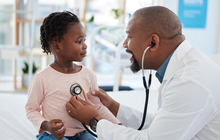 Purchased - Doctor with child