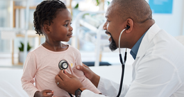 Purchased - Doctor with child