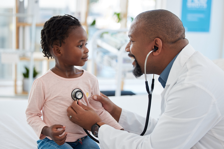 Purchased - Doctor with child