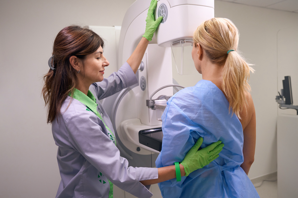 Purchased - A Woman Getting a Mammogram