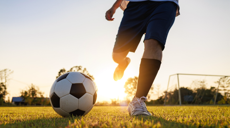Purchased - Teen playing soccer