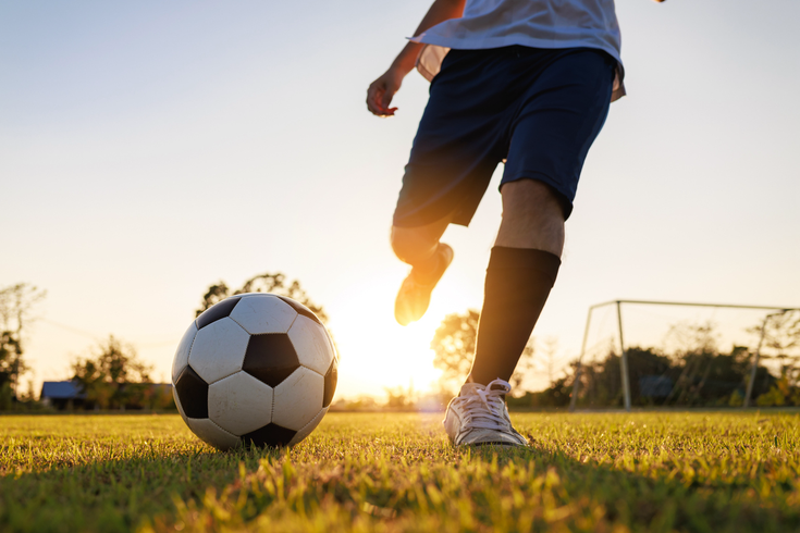 Purchased - Teen playing soccer