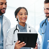 Purchased - Health care workers discussing a patient